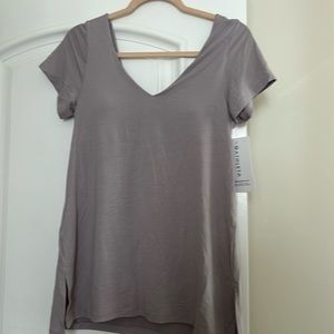 New Athleta top with built in bra. Sz M